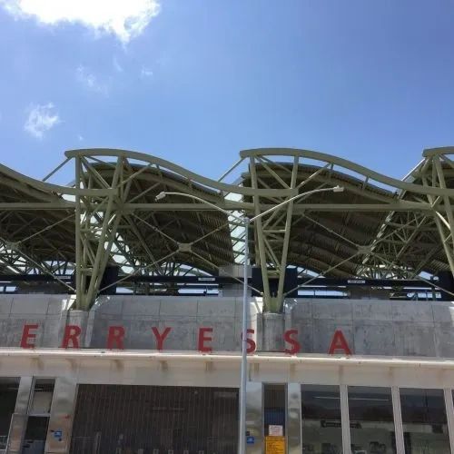 Stadium structure with green steel trusses
